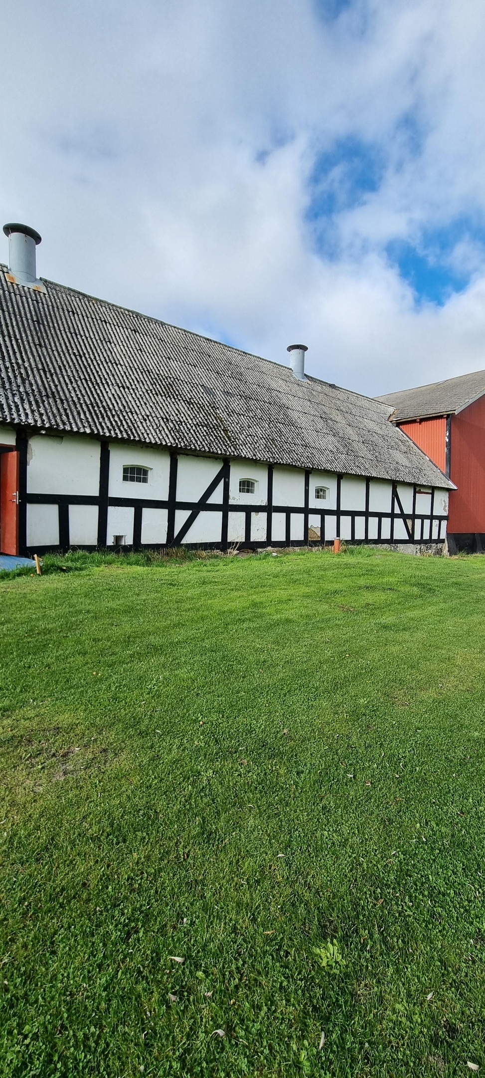 a modern kitchen with stainless steel appliances and marble counter tops